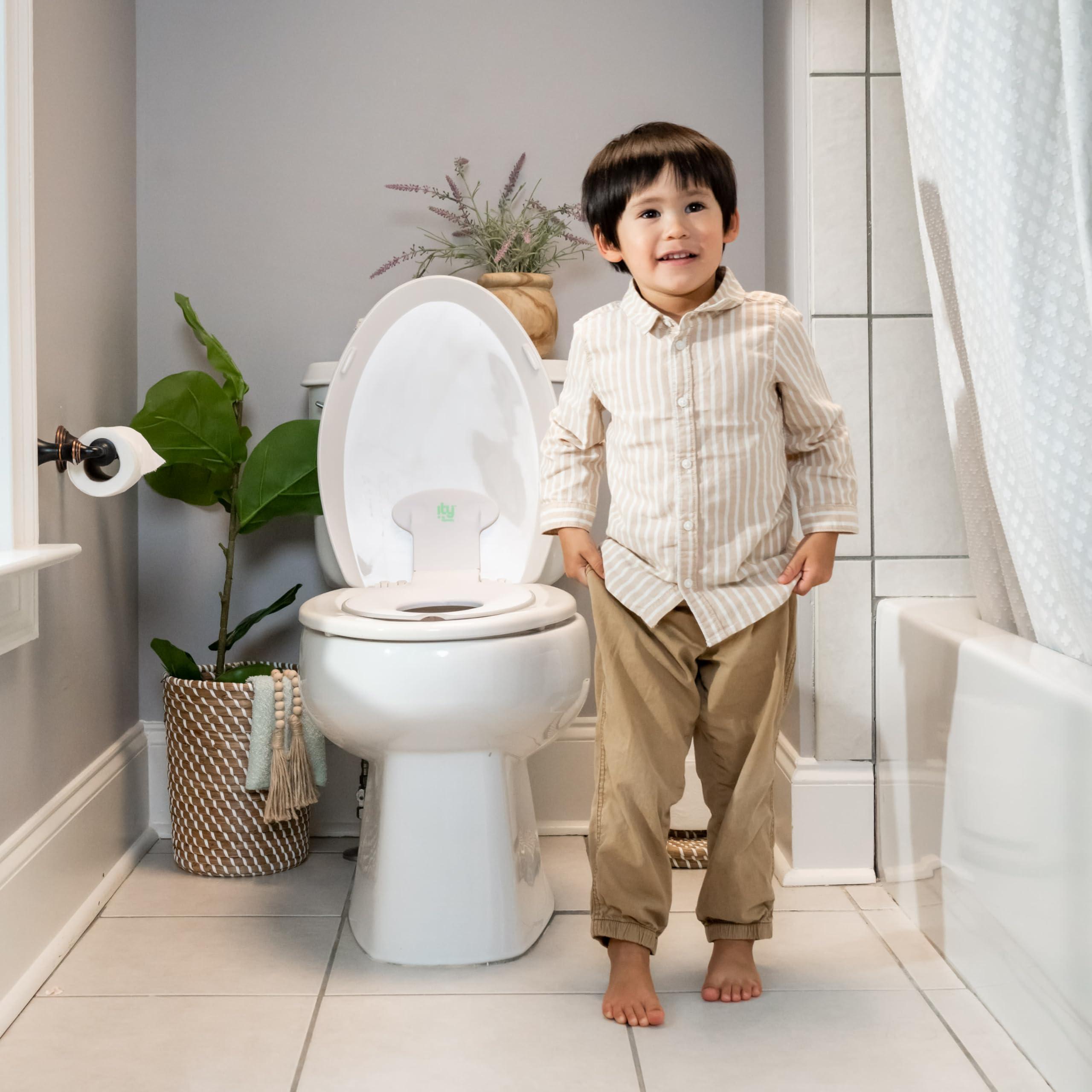 Ingenuity Ingenuity: ity by Ingenuity Flip & Sit Potty Seat (White) Easy to Set Up & Remove Potty Training Seat That Attaches to Adult Toilet Seat