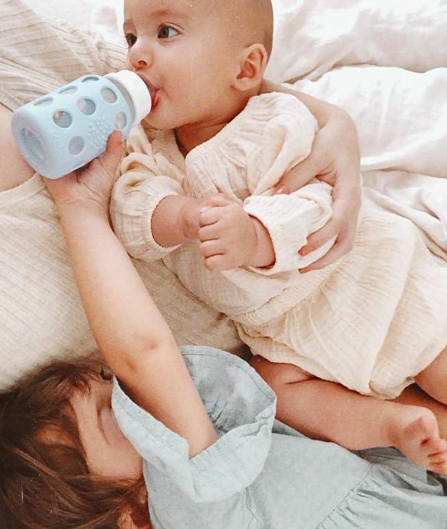 Lifefactory Lifefactory Glass Baby Bottles with Silicone Protection - 2-PACK, 4 Ounce Bottles, Pink & Sky Blue