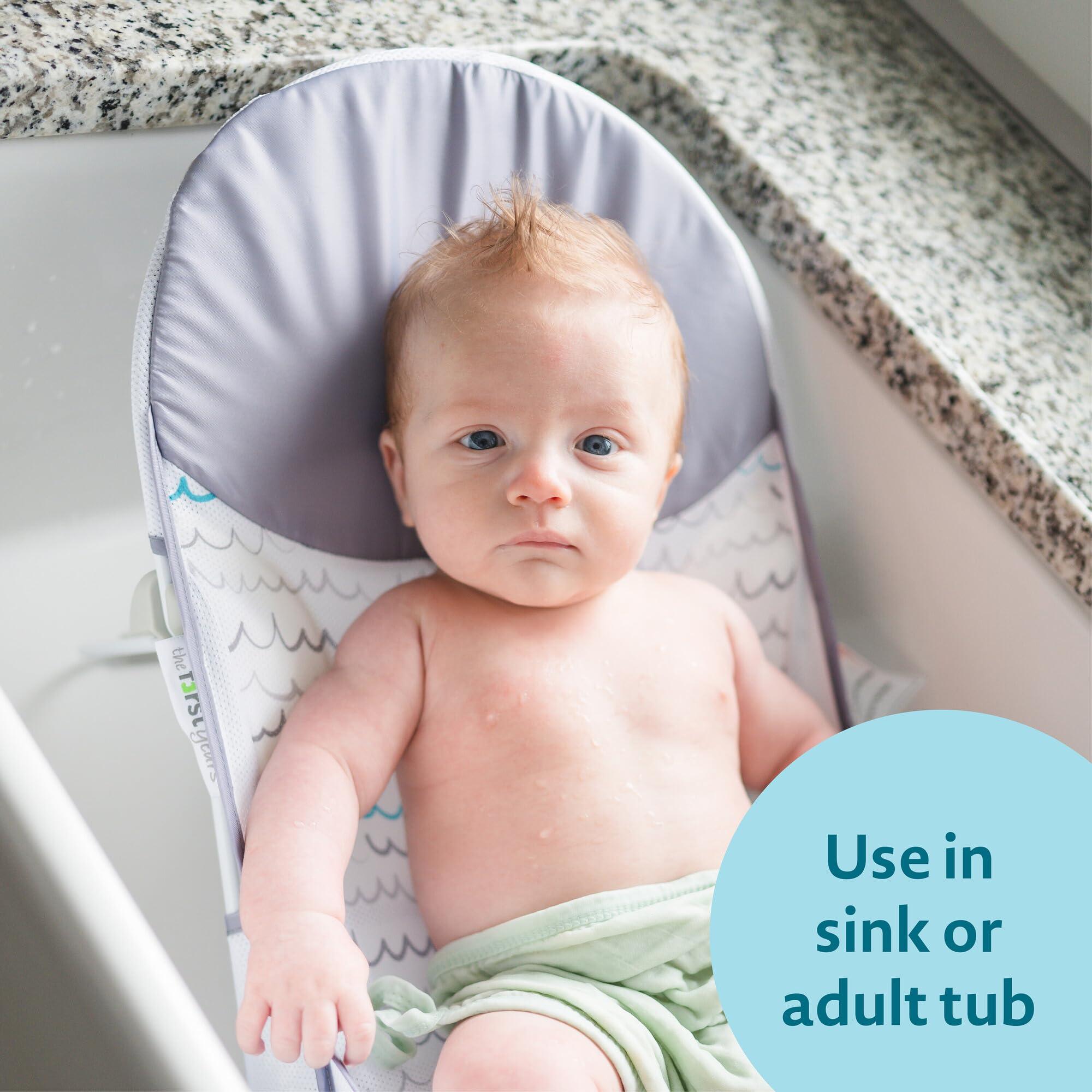The First Years The First Years Sure Comfort Folding Baby Bather - Baby to Toddler Bath Tub - No-Slip Seat - for Sink or Tub Use