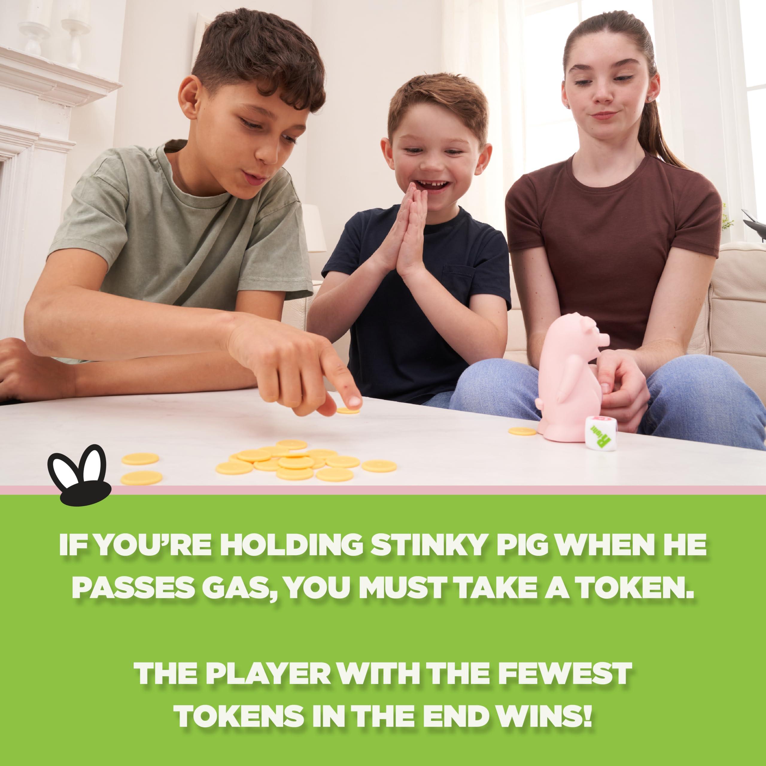 PlayMonster Stinky Pig Game Dice Game Family Games, Kids Games, Travel Games, Dice Set, Fast, Musical Active Kids Game with Funny Sounds, Family Games for Kids and Adults, Multi-Player, Ages 6+