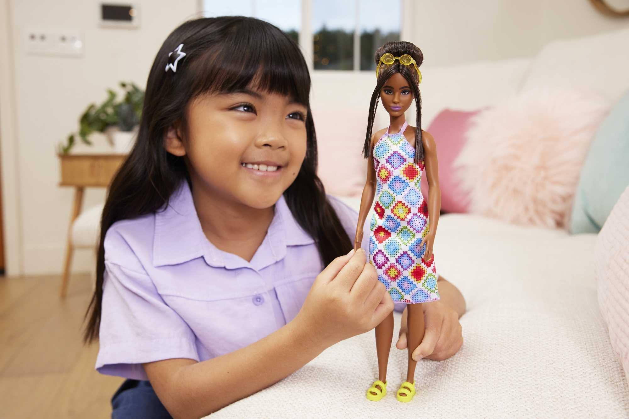 Barbie Barbie Fashionistas Doll #210 with Brunette Hair in Bun Wearing Removable Colorful Crochet Halter Dress, Sunglasses & Sandals