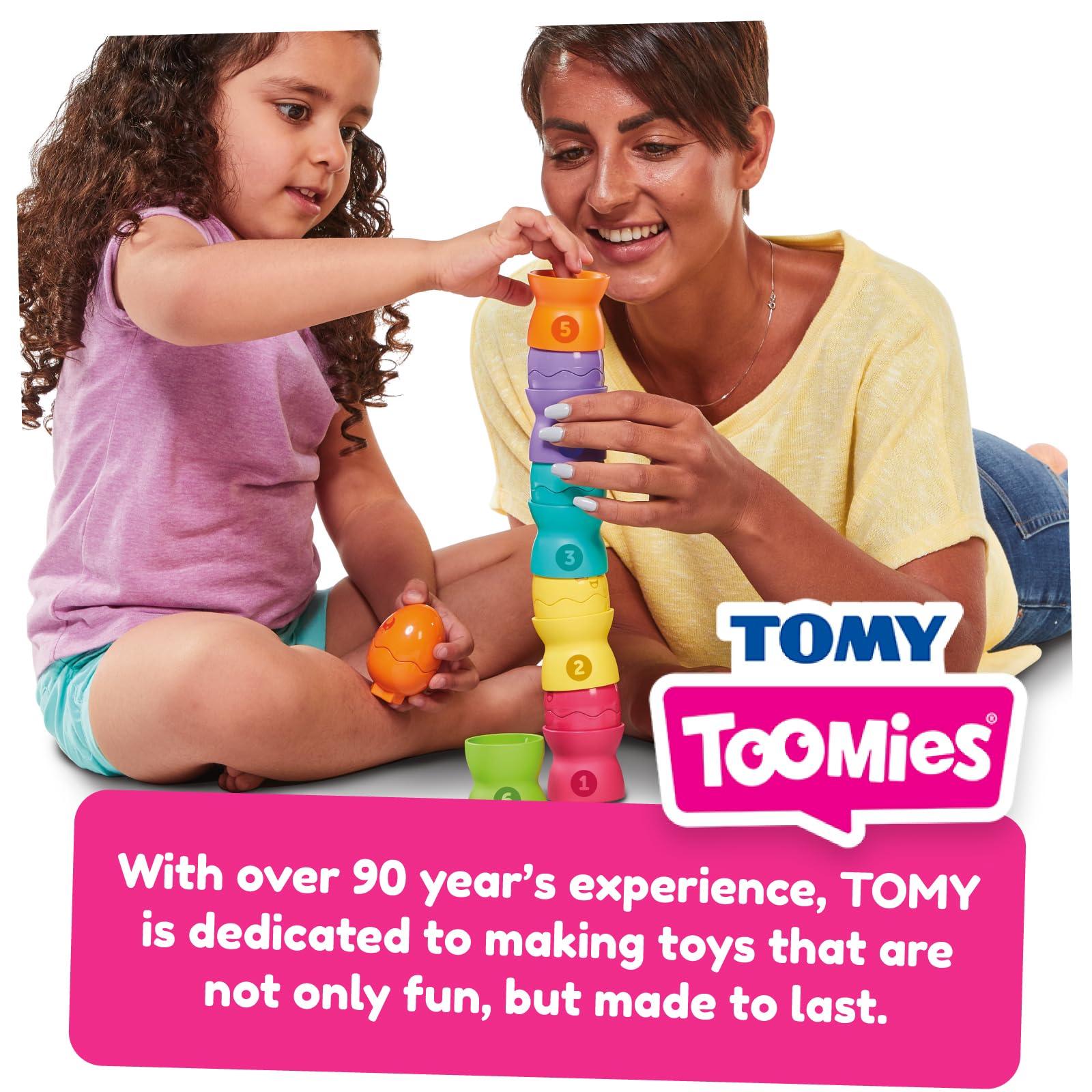 Toomies Toomies Tomy Hide and Squeak Egg Stackers Baby Toy - Stacking Egg Cups with 3 Squeak and 3 Rattle Eggs - Shape Sorter Toddler Toys - Engaging Baby Sensory Toys - Baby Toys 6 Months Plus to 36 Months