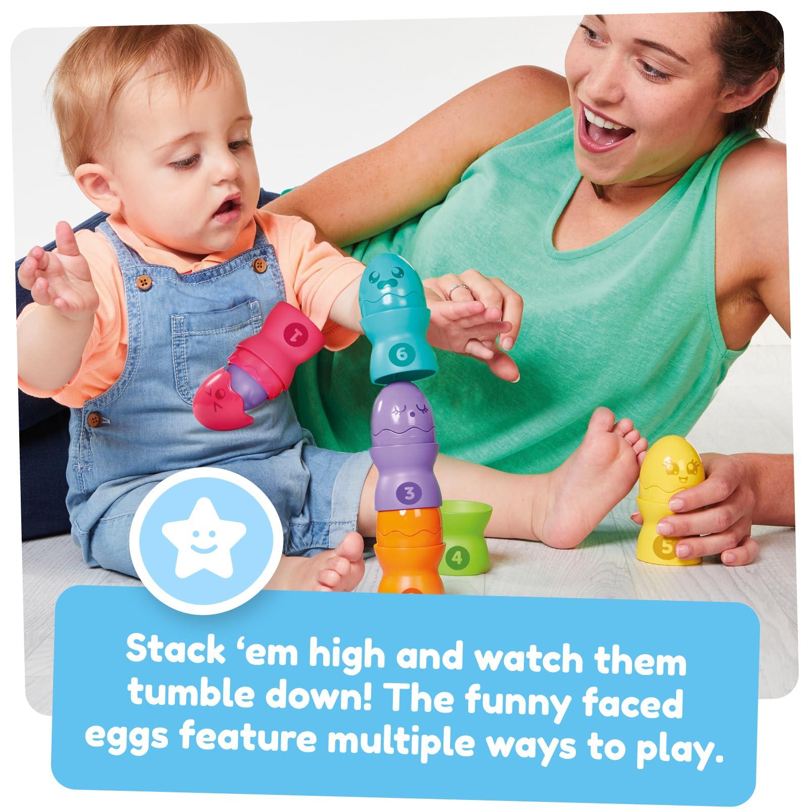 Toomies Toomies Tomy Hide and Squeak Egg Stackers Baby Toy - Stacking Egg Cups with 3 Squeak and 3 Rattle Eggs - Shape Sorter Toddler Toys - Engaging Baby Sensory Toys - Baby Toys 6 Months Plus to 36 Months