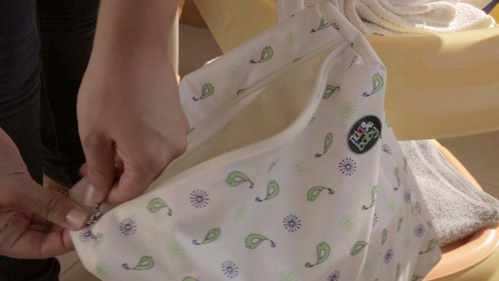 Ethikos Market Best Cloth Diaper Wet Bag by nuababy-DOUBLE waterproof layer to prevent leaks-machine washable-keeps smells in-easy zipper close-use for diapers, soiled clothing or as swim bag (Small, Bunny Tail)
