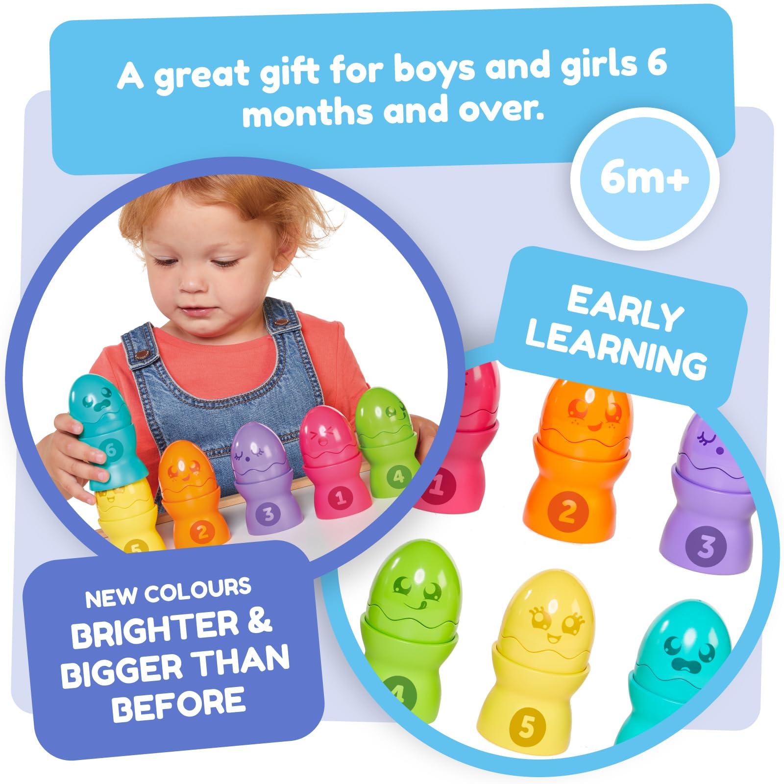 Toomies Toomies Tomy Hide and Squeak Egg Stackers Baby Toy - Stacking Egg Cups with 3 Squeak and 3 Rattle Eggs - Shape Sorter Toddler Toys - Engaging Baby Sensory Toys - Baby Toys 6 Months Plus to 36 Months