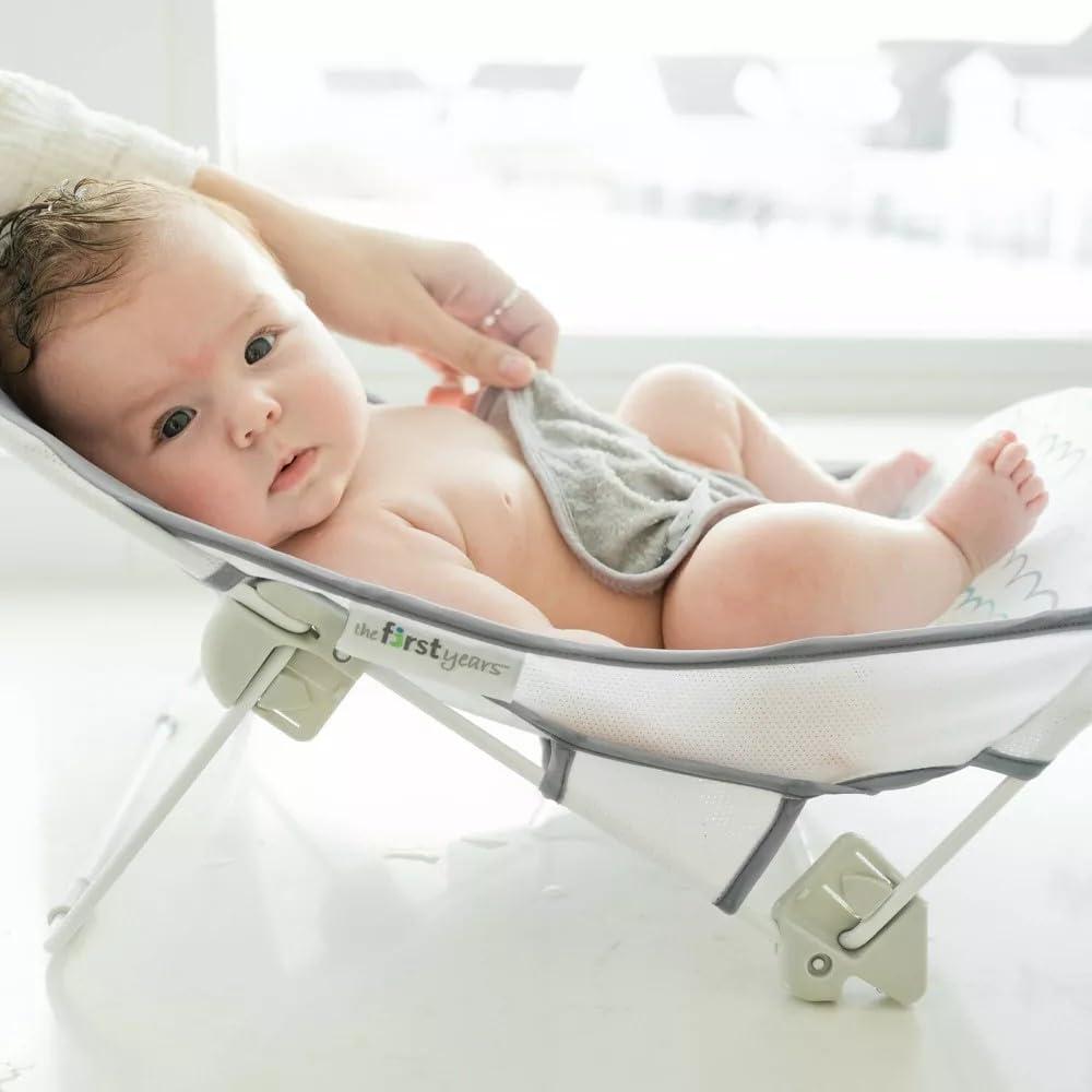The First Years The First Years Sure Comfort Folding Baby Bather - Baby to Toddler Bath Tub - No-Slip Seat - for Sink or Tub Use
