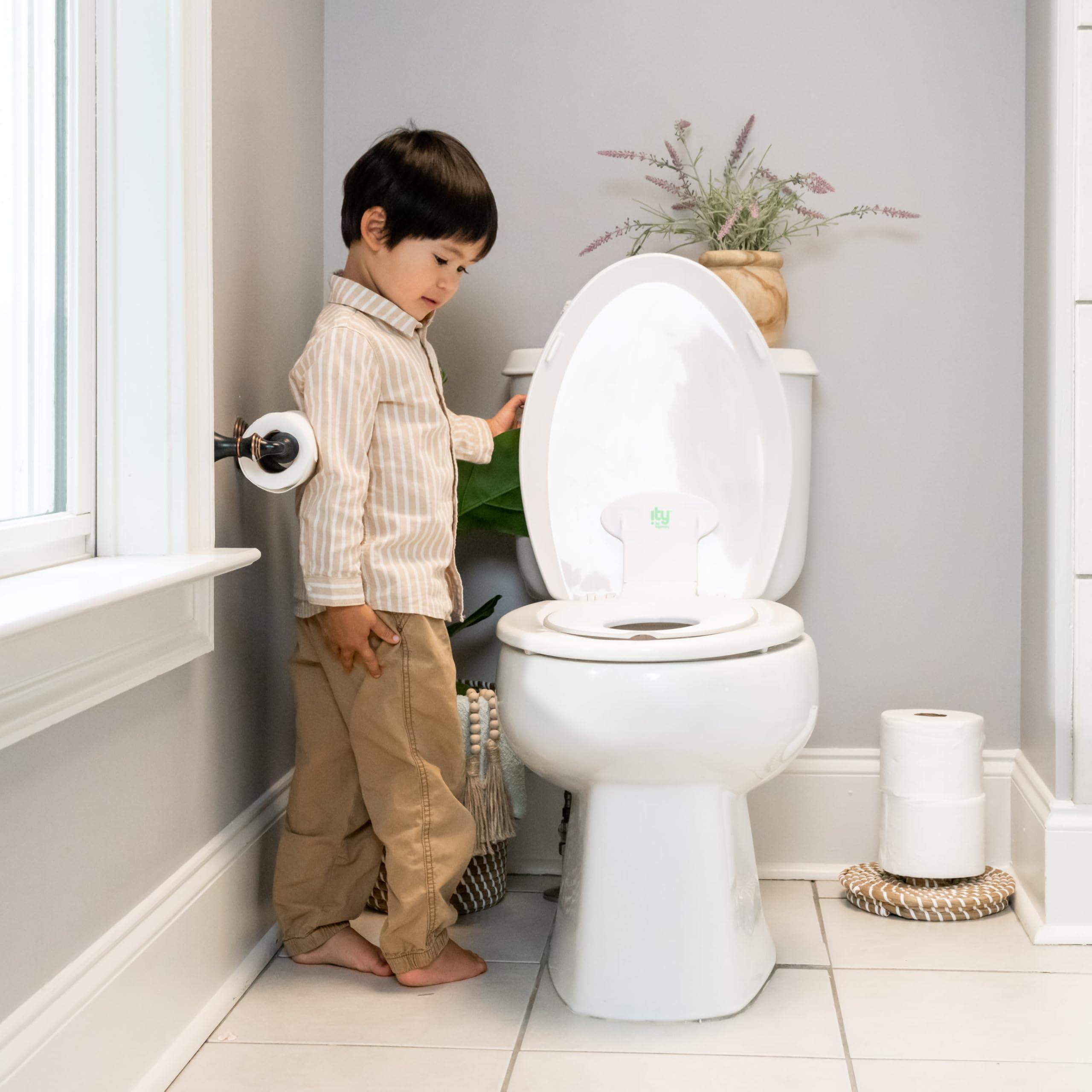 Ingenuity Ingenuity: ity by Ingenuity Flip & Sit Potty Seat (White) Easy to Set Up & Remove Potty Training Seat That Attaches to Adult Toilet Seat