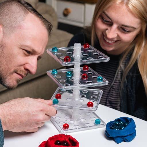 Jokari Jokari Take the Tower 3D Strategy Board Game for 2 To 4 Kids or Adults of Any Age. Easily Attach Rotating Playing Surfaces, Like Connect 4 Try to Align 4 Marbles, Turn a Level to Alter Opponent\'s Plan