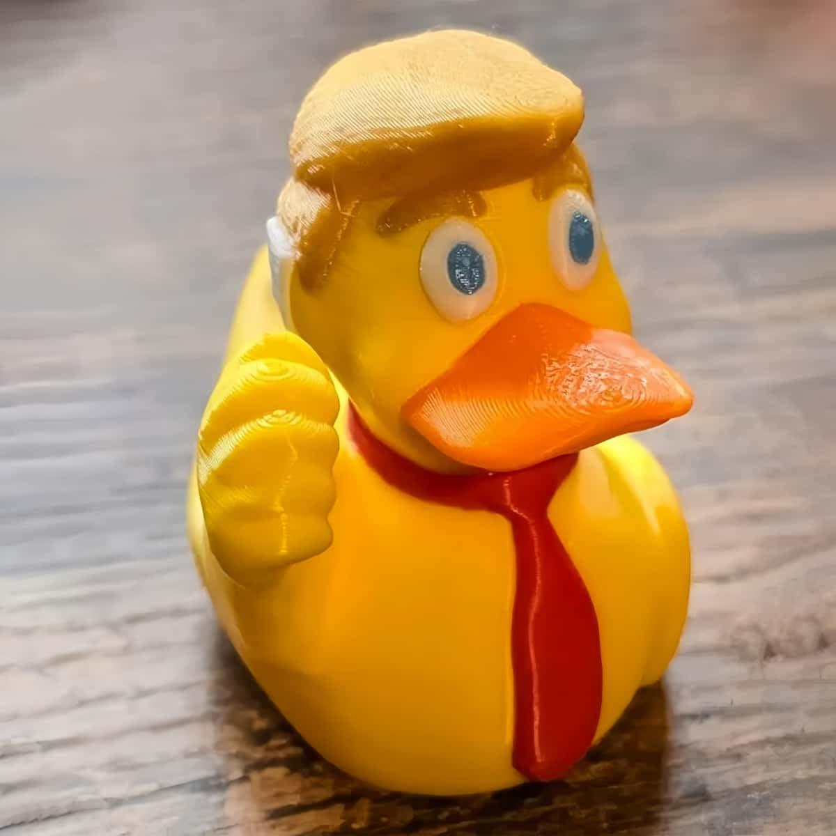Aimery Aimery 2024 Double Middle Finger Duck with Ear Bandaid, Donald Trump Duck, Trump Ducks for Jeeps, Fist Trump Ducks Funny Gifts Toys for Party Favors (Fist Trump) (Fist Duck)