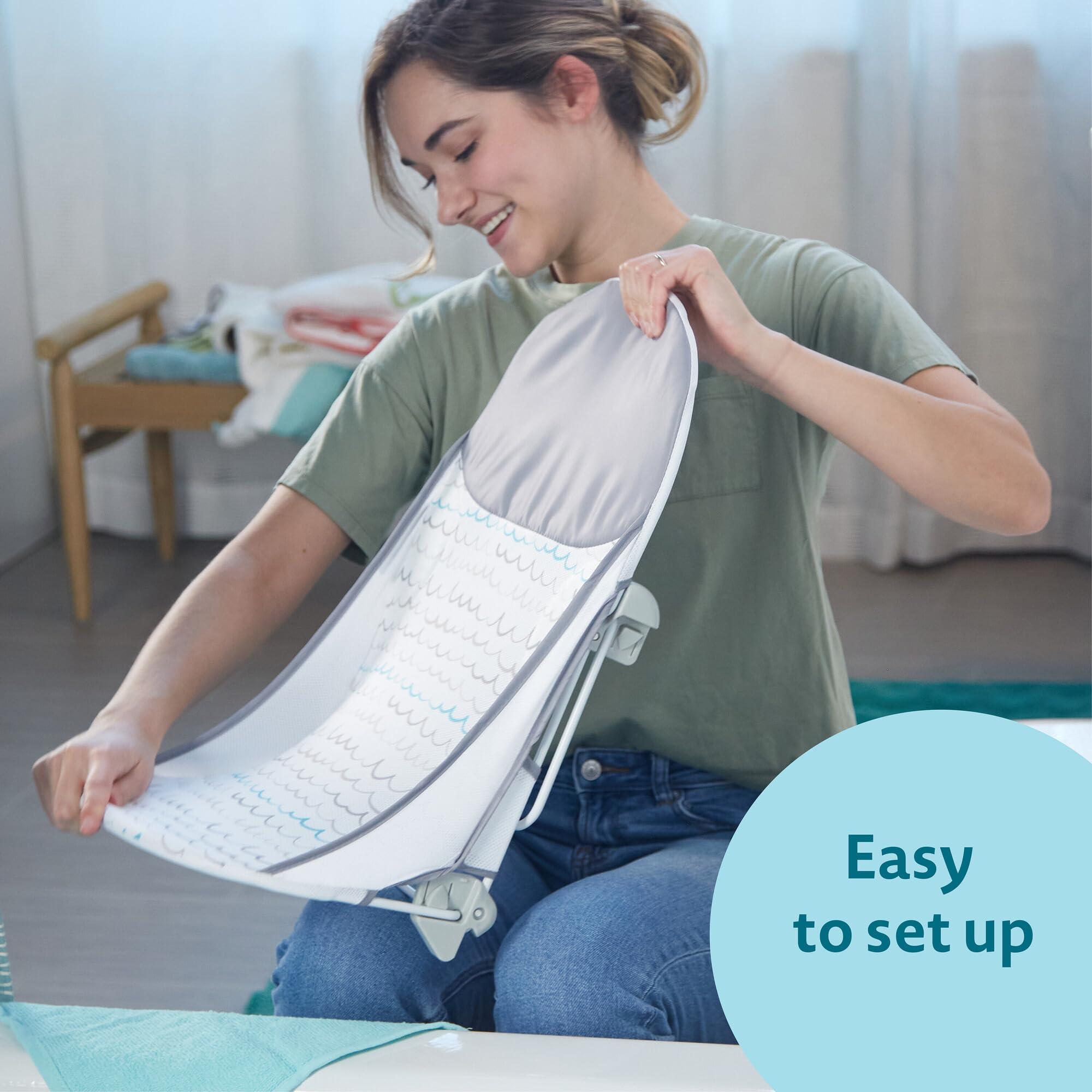 The First Years The First Years Sure Comfort Folding Baby Bather - Baby to Toddler Bath Tub - No-Slip Seat - for Sink or Tub Use
